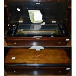 A 19th century inlaid rosewood music box, with a detached, tune sheet, torn off and part lacking,