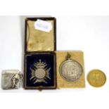 A golfing theme vesta case stamped 925 sterling, silver gilt Artisan golfers association medal,