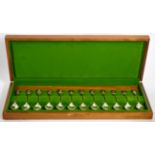 The Royal Horticulture Flower spoons, a set of twelve parcel gilt spoons in presentation box, John