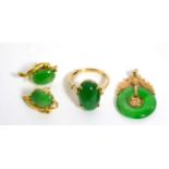 A jade ring, pair of jade earrings and a jade bi pendant Jade ring - Finger size O, 4.5g gross.