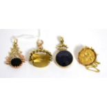 A 1910 half sovereign mounted as a brooch and three hardstone fobs Brooch - 5.88g gross. Three