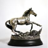 A cast silver model of a horse, ''Startled Yearling'' by Geoffrey Snell produced for The British