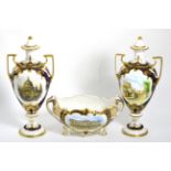 Three Spode Royal commemorative pieces comprising two similar urns and covers, one depicting St