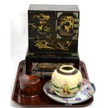 Oriental items to include a lacquer table cabinet, inkstand decorated with dragons; South east Asian