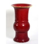 A Chinese sang de boeuf Gu vase, 30cm high