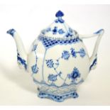 A Royal Copenhagen blue and white teapot and cover