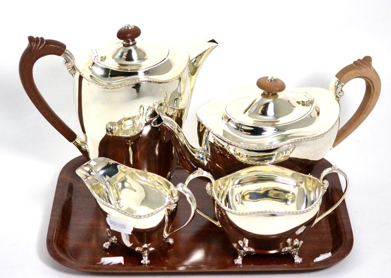 A four piece silver tea service