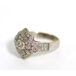 An 18 carat white gold Art Deco style diamond ring, total estimated diamond weight 0.70 carat