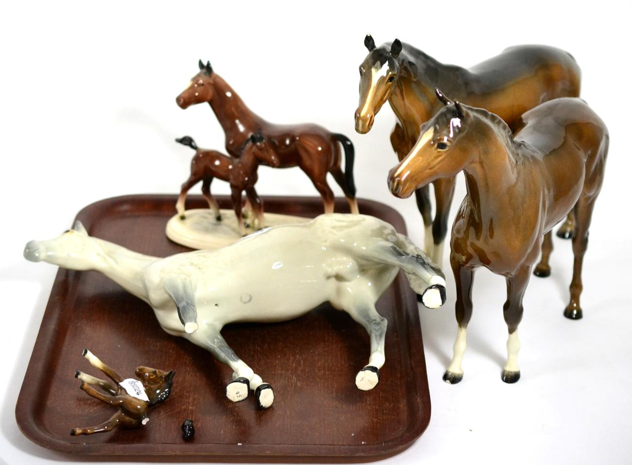 Collection of Beswick horses (with damage), plus one mare and foal (broken parts present)