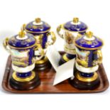 Four Ainsley commemorative twin handled cups and covers for The Wedding of Prince Charles and