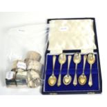 Eight silver napkin rings and set of six spoons, cased (qty)