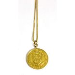 A 9 carat gold medallion on chain 10.71g gross