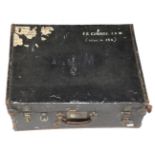 A 1920/30s Black Leather Car Luggage Case, with hinged lid, canvas interior, the base a wooden