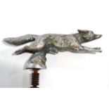 A 1940s Chrome Car Mascot in the form of a Running Fox, mounted on tree stump with original fixing