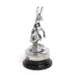 A 1930s Chrome Alvis Seated Hare Car Mascot, mounted on a radiator cap and black plastic base, 15.