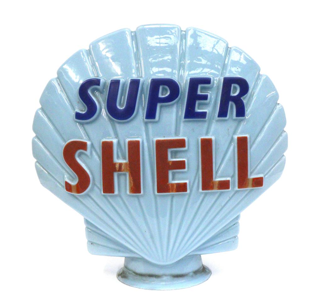 A Vintage Super Shell Blue Glass Petrol Pump Globe, the interior of the neck stamped Property of