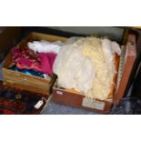 A suitcase and a box containing 19th century and later adults and children's clothing