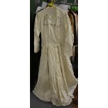 Circa 1940s wedding dress, labelled Jane Jones, Sunderland, with beaded decoration to the collar,