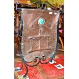 An Arts & Crafts copper and wrought iron fire screen with ruskin type cabochon