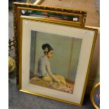 After Gerald Kelly, a signed print of a seated princess, framed and glazed; together with a gilt