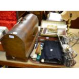 A Singer sewing machine in plywood case; 1930's barbers case and contents; plated wares; cutlery etc