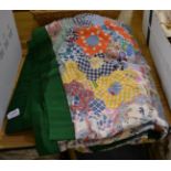 20th century patchwork quilt, worked in hexagons of variously patterned and coloured fabrics, backed