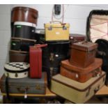 A collection of mid 20th century and later luggage, including hat cases, vanity cases, suitcases,