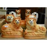 Two pairs of 19th century Staffordshire lions and two pairs of Staffordshire dogs (a.f.) (8)