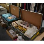 Quantity of assorted textiles, white linen, sewing accessories, handbags, cased cutlery set,