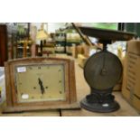 An Art Deco oak mantel clock signed Croydon & Sons, Ipswich; and a large set of Salters Improved