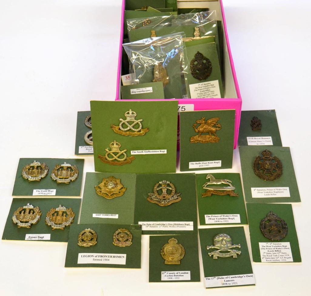 A Collection of Sixty Two British Military Badges, including cap, glengarry, collar and helmet