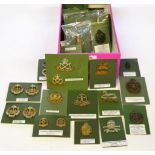 A Collection of Sixty Two British Military Badges, including cap, glengarry, collar and helmet