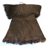 A 19th/20th Century Polynesian/Indonesian Warrior's Jacket, of woven palm fibre, with rolled