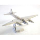 A Cast White Metal Model of a De Havilland Mosquito, on a shaped pillar and triangular base, 39 cm