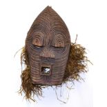 A Songye Female Kifwebe Mask, DRC, the domed forehead with slightly raised crest, hooded eyes,
