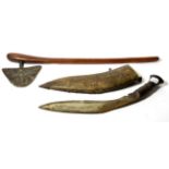 A Shona Axe, with rounded triangular shape blade, the tang inserted into the swollen pommel of the