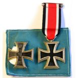 An Imperial German Iron Cross, first class, the reverse stamped KO, with vertical pin fastener,