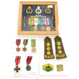 An Iranian Group of Four Medals, 1941-1979, comprising Service Medal, Silver Jubilee 1966 with crown