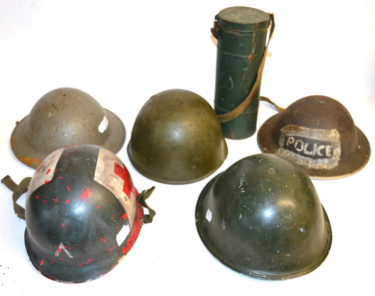 Two Second World War Brodie Helmets, one lacking liner; a 1943 Pattern British Army Helmet, with ''