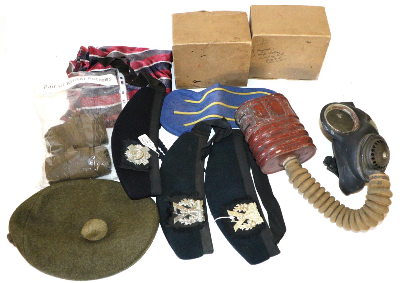 A Collection of Glengarries, Side Caps and Berets, comprising Cameron Highlanders, with plated