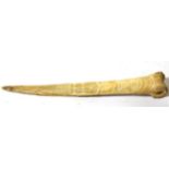 A Highlands Bone Dagger, Papua New Guinea, made from the leg bone of a cassowary bird, carved with a