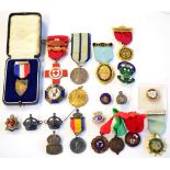 A Collection of Medals, Medallions and Badges, including a British Red Cross Society Proficiency