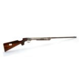 PURCHASER MUST BE 18 YEARS OF AGE OR OVER A BSA-Type Underlever Tap Action Air Rifle, the walnut