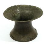 An Early Ashante Bronze Vessel, of waisted cylindrical form, the flange rim pierced and stamped with