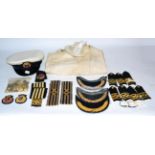Merchant Navy Items Relating to the Shell Line, including a peaked cap, raised bullion cap badges