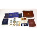 A Quantity of Masonic Regalia, comprising five silver gilt and enamel jewels, including a good