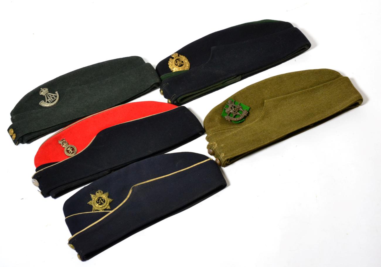Five British Field Service Caps, to the Royal Devon Yeomanry Artillery, Durham Light Infantry,