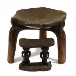 A Senufo, West Africa Wood Stool, made from one piece of wood, the dished circular seat with block