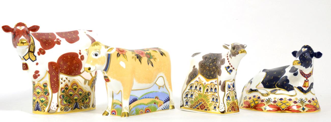 Royal Crown Derby Imari paperweights; Bluebell Calf, Fresian Cow 'Buttercup', Lily and Daisy Cow (