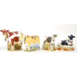 Royal Crown Derby Imari paperweights; Bluebell Calf, Fresian Cow 'Buttercup', Lily and Daisy Cow (